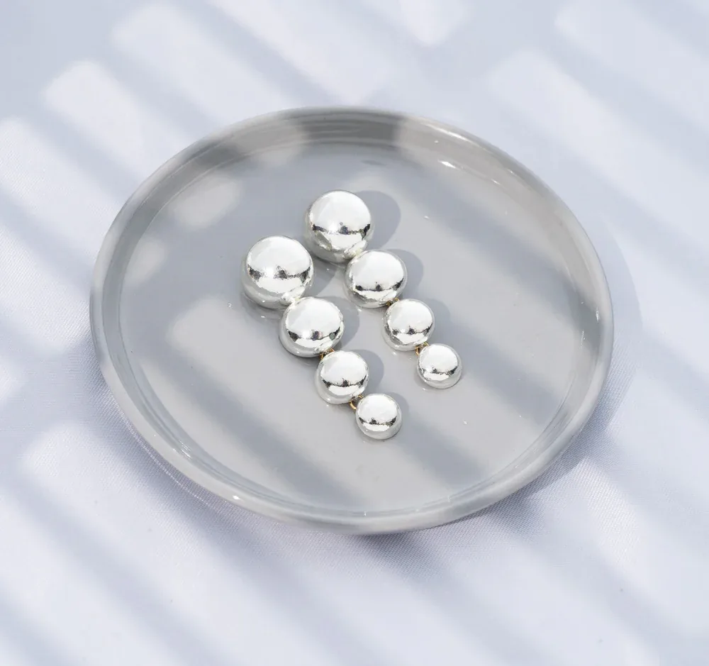 Aretes Colgantes de Esferas