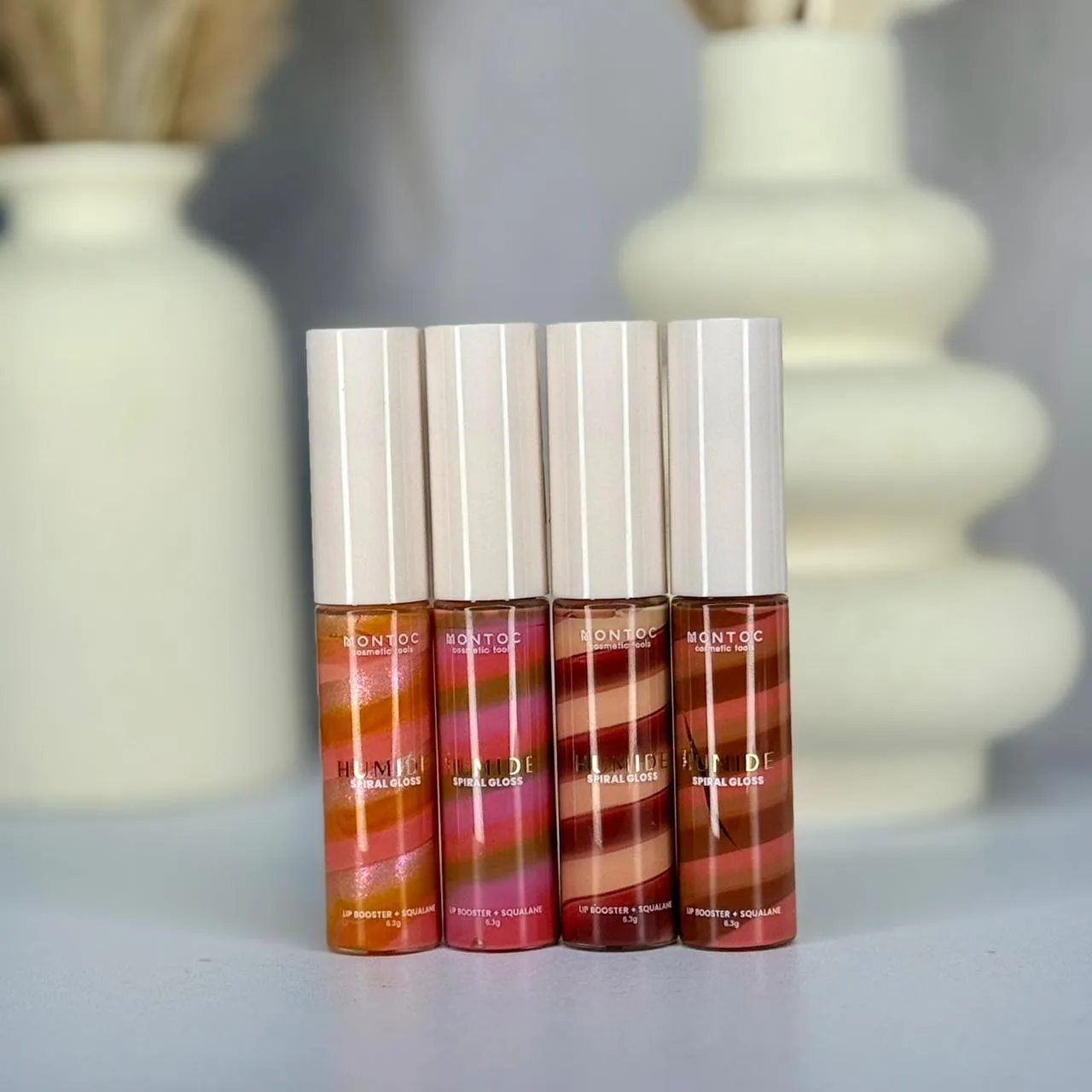 SPIRAL GLOSS MONTOC